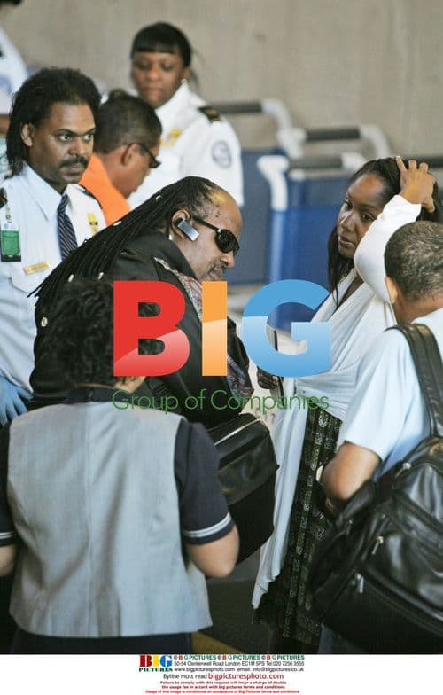 Stevie Wonder and Daughter at LAX