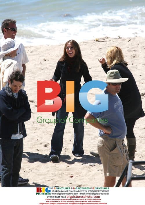 Jennifer Love Hewitt Stretching on Beach
