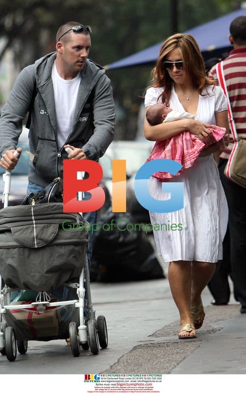Myleene Klass pushes baby Ava in pram