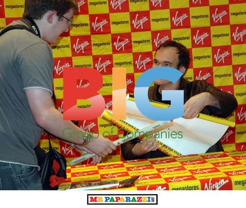 Quentin Tarantino Signing DVDs