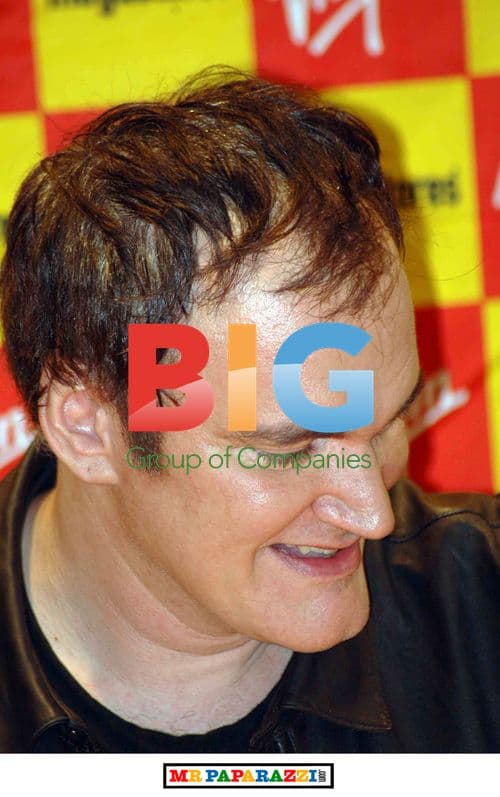 Quentin Tarantino Signing DVD's for Fans