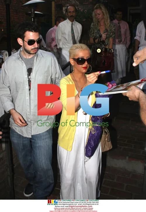 Christina Aguilera Greeted with Flowers, Pregnancy Congrats