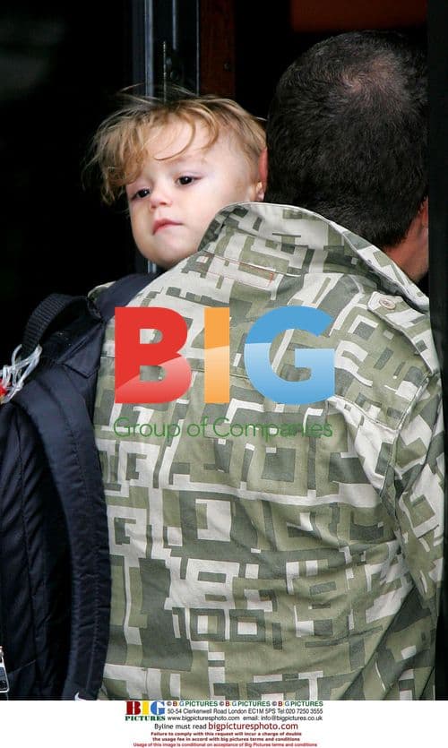 Gwen Stefani Leaves Paris Hotel with Son