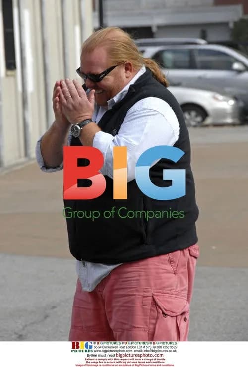 Mario Batali plays touch football with kids