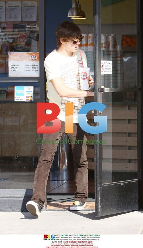 Zac Efron at the bank after trip