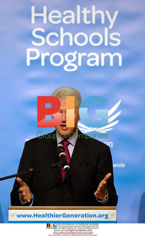 Bill Clinton and Arnold Schwarzenegger at Health Event