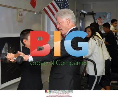 Bill Clinton Assists Student at School