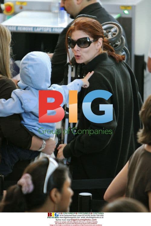 Debra Messing and Son Depart LAX