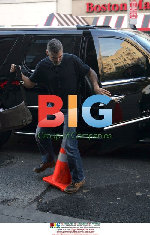 George Clooney Signing Autographs on Set