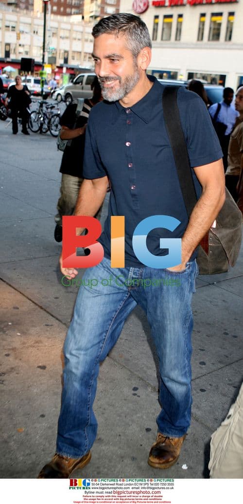 George Clooney Signs Autographs on Movie Set