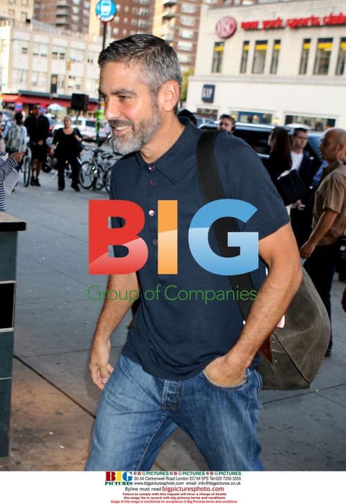 George Clooney Signing Autographs on Set