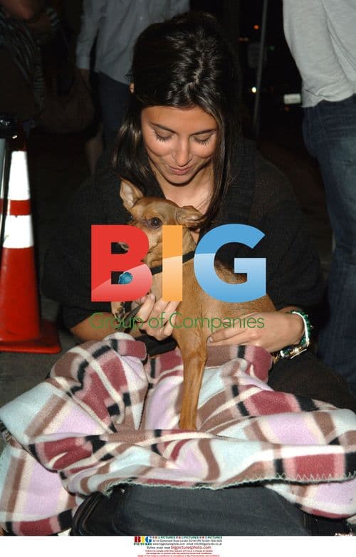 Jamie Lynn Sigler with Puppy Outside Koi