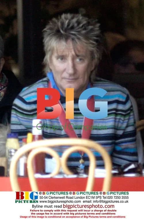 Rod Stewart Shows Off CBE Medal