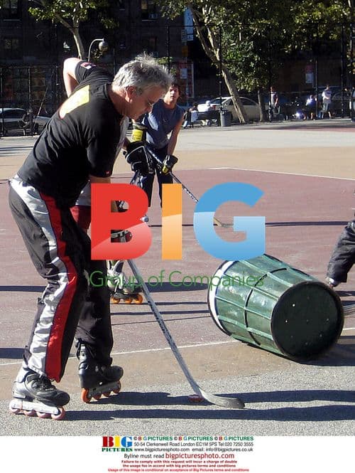 Tim Robbins Plays Roller Skate Hockey in Public Park