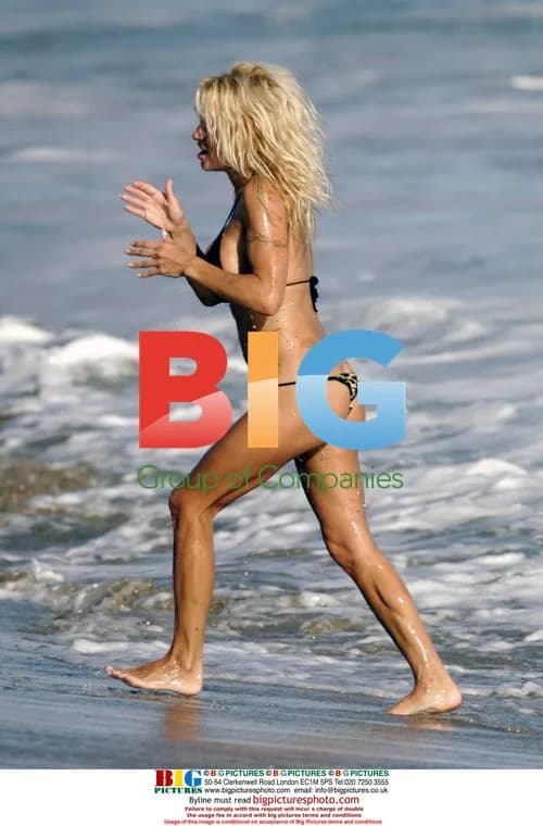 Pam Anderson & Rick Solomon Frolic in Malibu