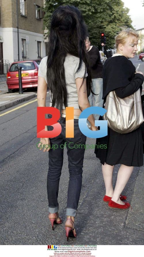 Amy Winehouse Seen in Pink Shoes