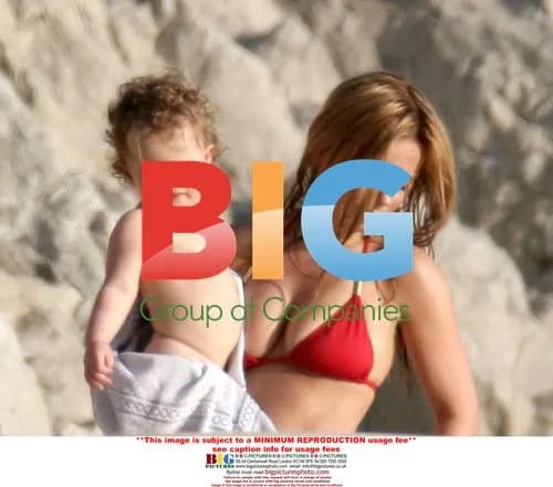 Geri Halliwell and Daughter Enjoy Beach Vacation