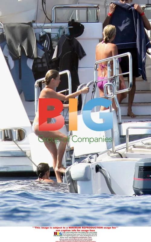 Kate Moss Enjoying Topless Swim With Friends