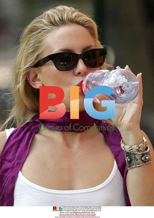 Kate Hudson Spotted Drinking Water in Soho