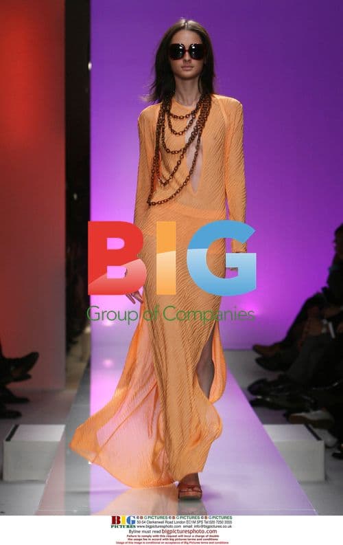 Model in Orange Ferragamo Dress