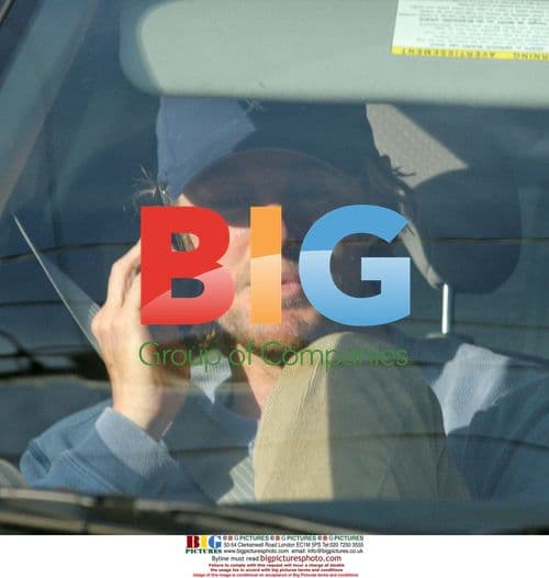 Owen Wilson Chatting on Cell Phone