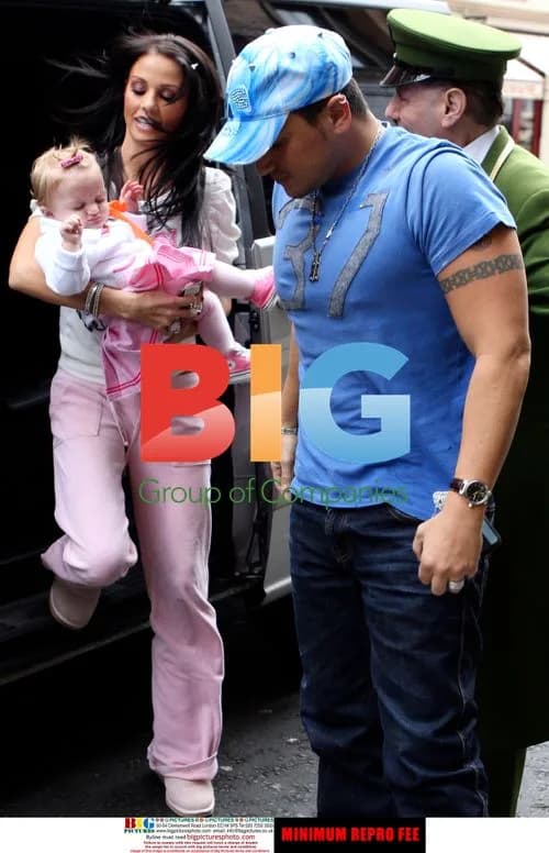 Katie Price and Peter Andre with baby daughter