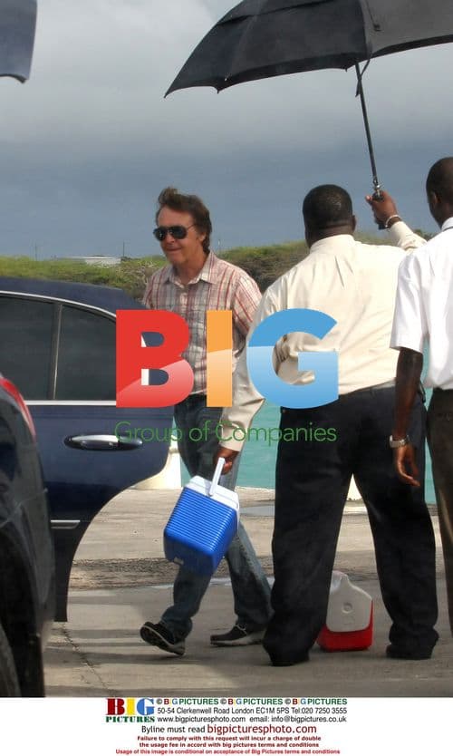 Paul McCartney with Nancy Shevell at Airport