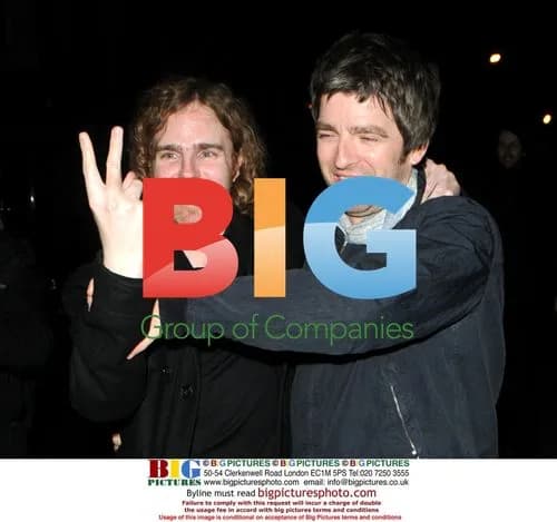 Noel Gallagher Larks About with Friend