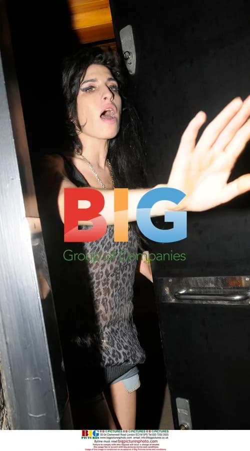 Amy Winehouse Answers Door
