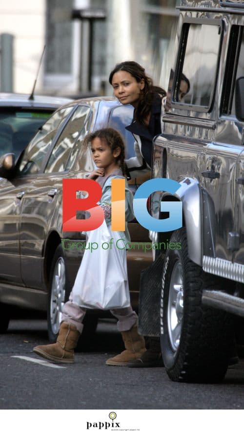 Thandie Newton and Daughter Ripley Crossing Street