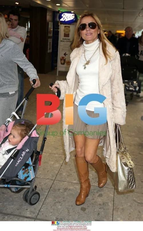 Singer Geri Halliwell and daughter at Heathrow Airport