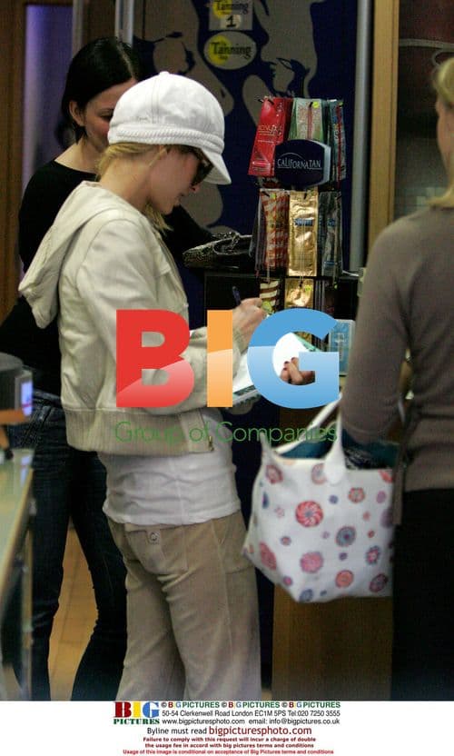 Paris Hilton and Benji Madden visit London 'Tanning Shop'