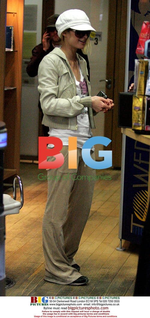 Paris Hilton and Benji Madden visit Tanning Shop in London