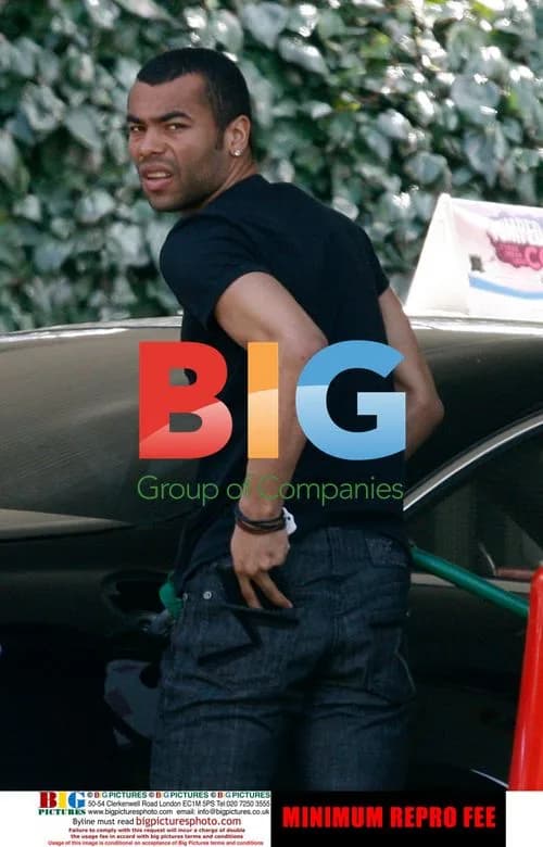 Ashley Cole leaving petrol station without wedding ring