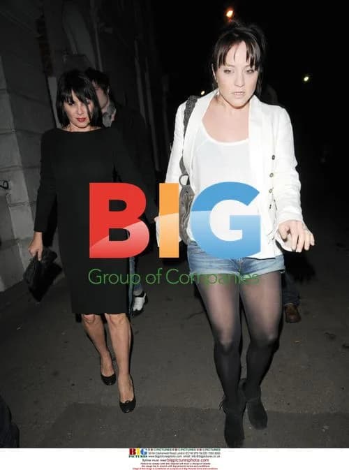 Sadie Frost Tries to Cover Bruised Legs