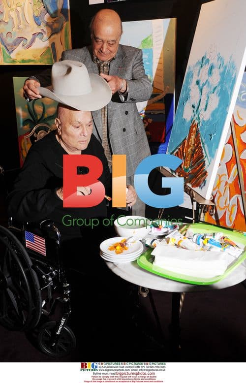 Tony Curtis and Mohamed Al-Fayed at Harrods Art Show