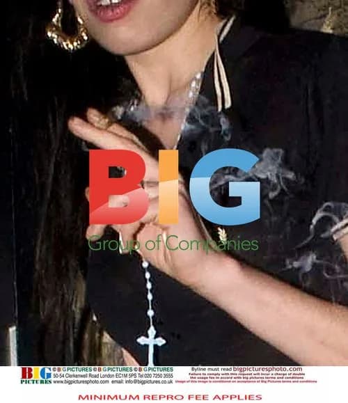 Amy Winehouse Returns Home After Birthday Party