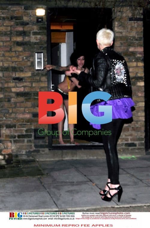 Amy Winehouse in Shorts and Bra