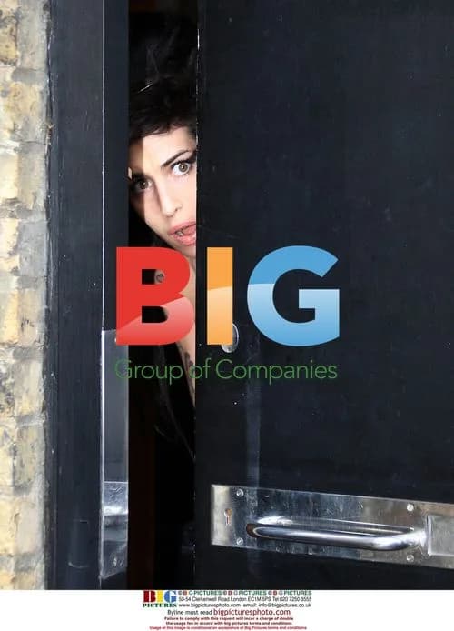 Amy Winehouse Peeks Out of House