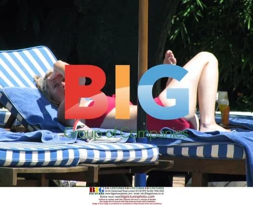Nicole Appleton Relaxing by Pool in Marbella