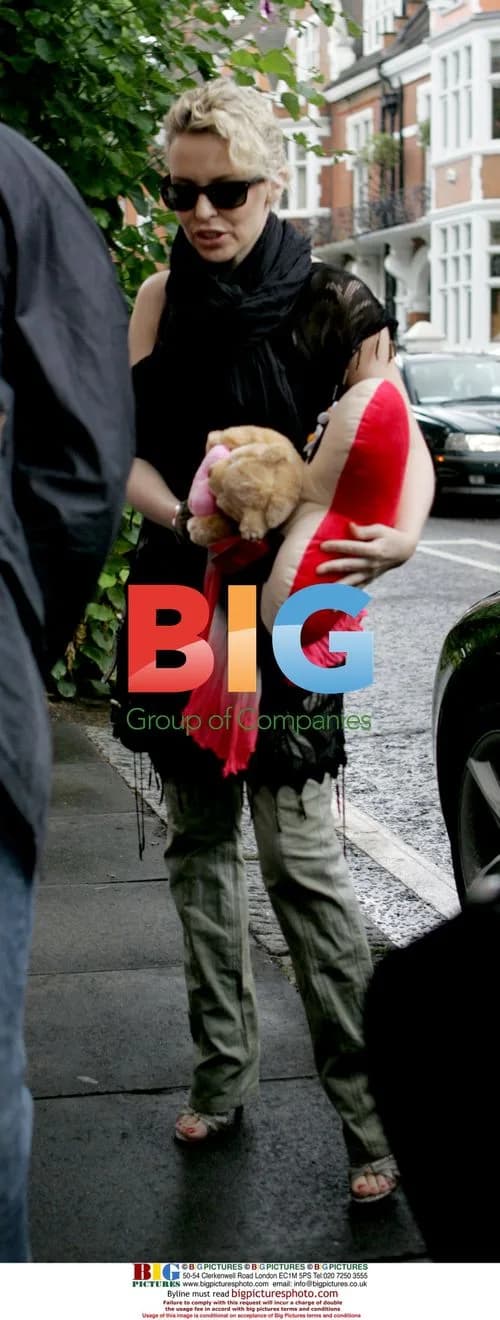Singer Kylie Minogue signs for fans