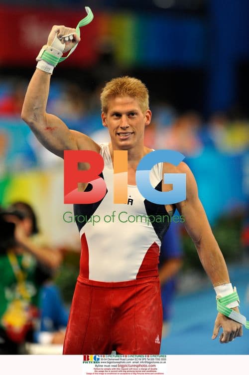 Gymnast Justin Spring Celebrates