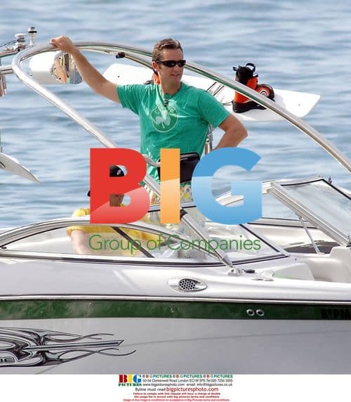 Urdangarin teaching sons to water ski