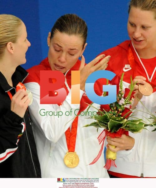 Natalie Coughlin wins 100M Backstroke