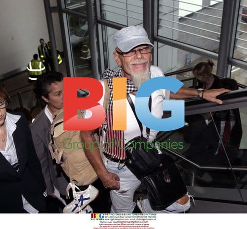 Gary Glitter returns to UK after jail