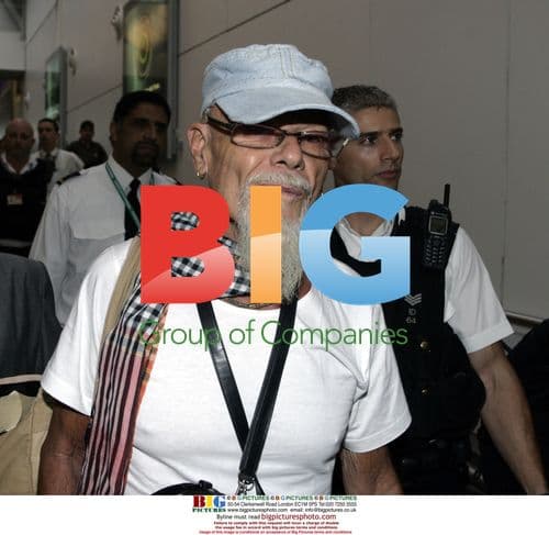 Gary Glitter returns to UK after jail