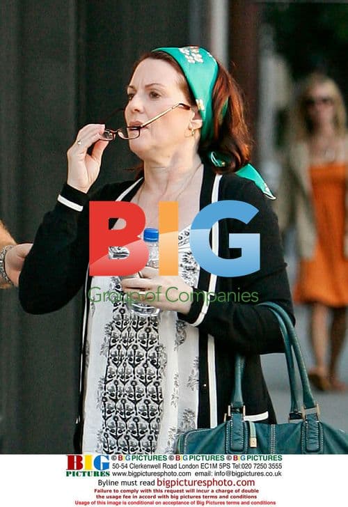 Megan Mullally and Nick Offerman with dogs