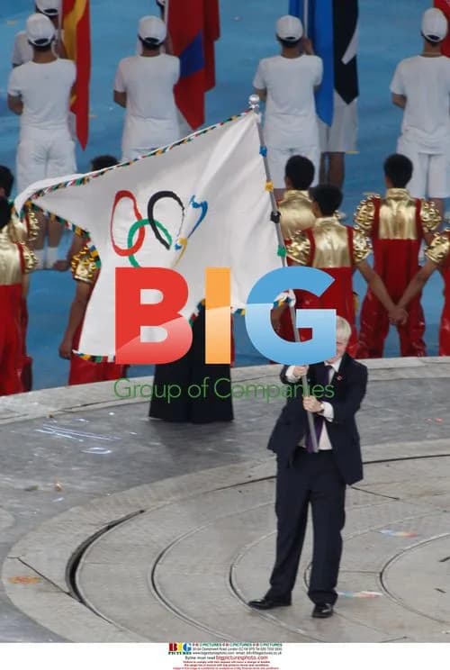 Boris Johnson waves Olympic flag in Beijing