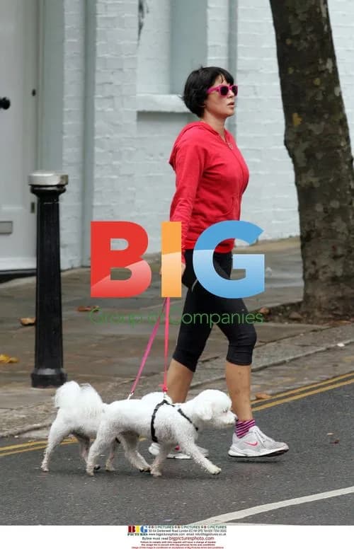 Sadie Frost Drops Phone in Park