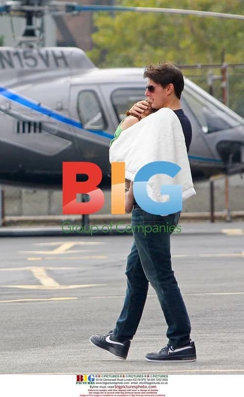 Tom Cruise leaves with daughter Suri